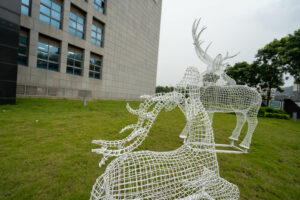 Metal hollow deer sculpture